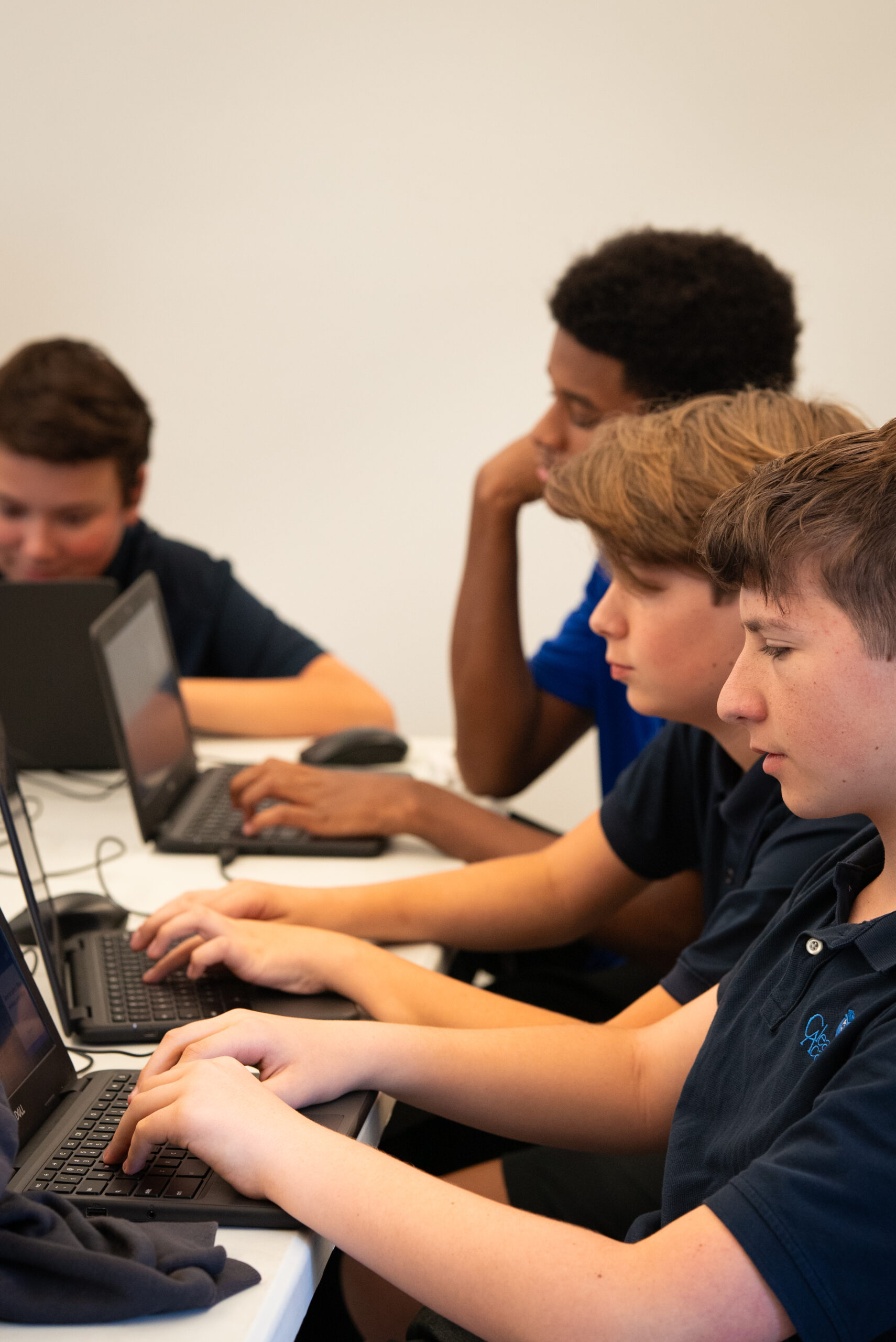 Clearwater Academy teacher working with a young student